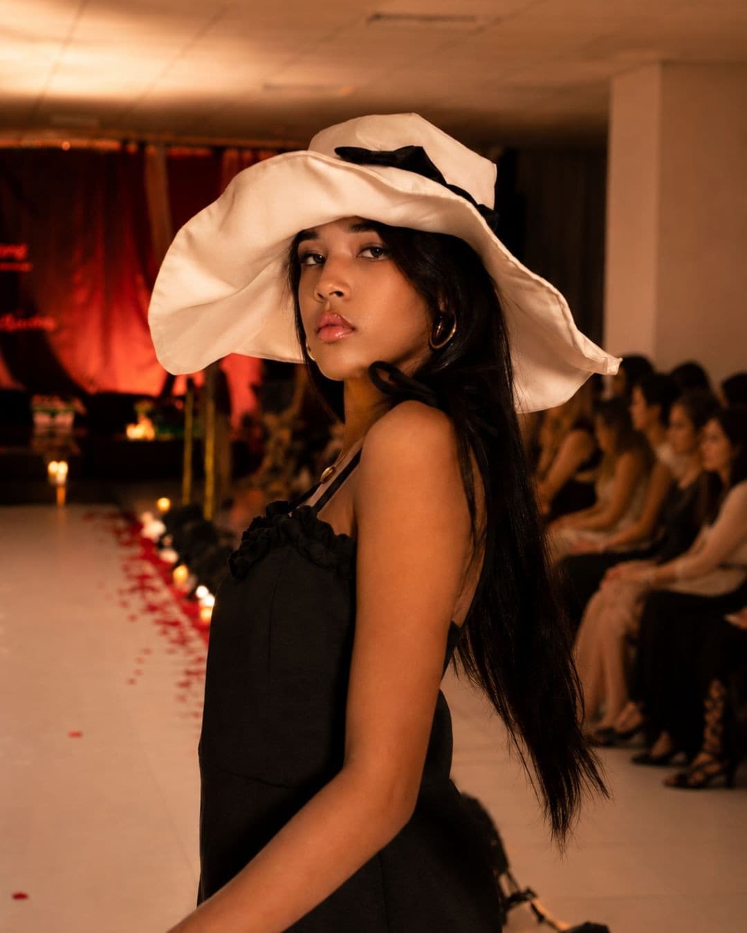The Midnight Coquette on the runway at The Becoming Collection